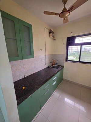 Kitchen in  Pg at Megh Malhar Co-op Housing Society, Ghansoli – for Rent