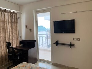 Living Room in 1 BHK Apartment at ROF Amaltas, Sector 92 – for Rent