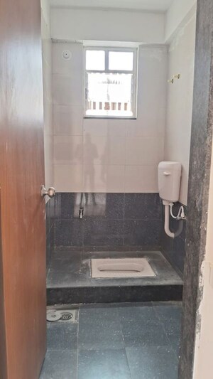 Bathroom in 2 BHK Apartment at Rahul Sky Crest, Hadapsar – for Rent