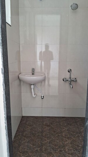Bathroom in 2 BHK Apartment at Rahul Sky Crest, Hadapsar – for Rent