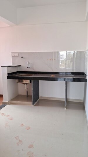 Kitchen in 2 BHK Apartment at Rahul Sky Crest, Hadapsar – for Rent