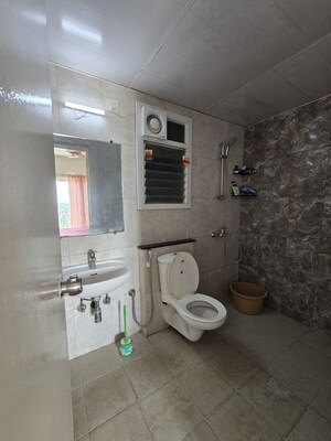 Bathroom in 3 BHK Apartment at Mantri Webcity, Hennur Road – for Rent