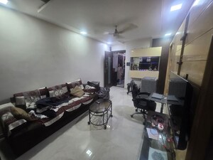 Living Room in 1 BHK Apartment at Mittal Tower CHS, Kopar Khairane – for Rent