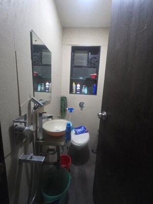 Bathroom in 1 BHK Apartment at Mittal Tower CHS, Kopar Khairane – for Rent