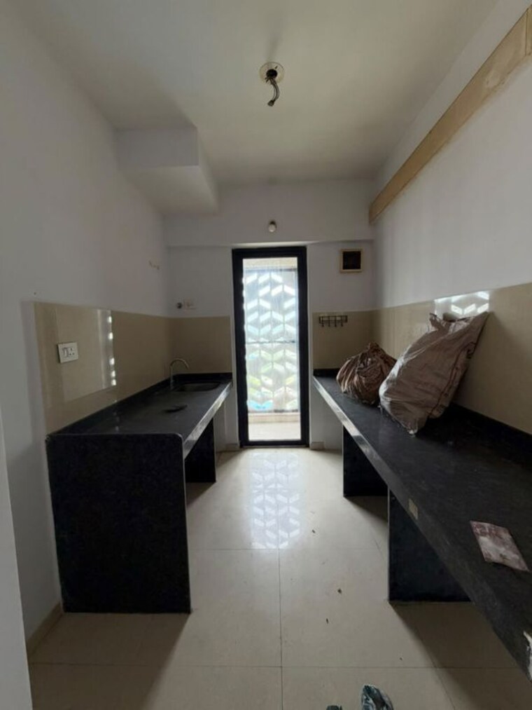Kitchen, lodha-palava-downtown 2 Bedroom 990 Sq.Ft. Apartment In Dombivli East Thane 10712208
