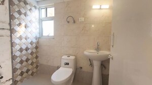 Bathroom in 2 BHK Apartment at Eureka Diya Green City, Raj Nagar Extension – for Sale