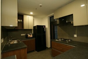 Kitchen in 3.5 BHK Apartment at Krisumi Waterfall Residences, Sector 36a – for Rent