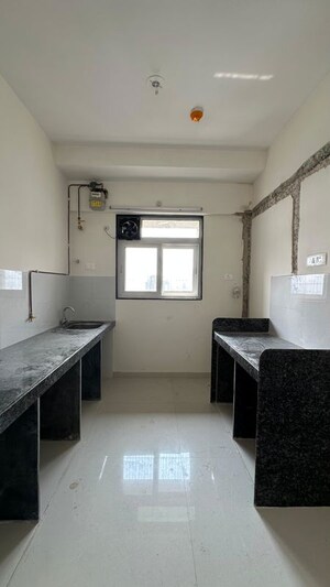 Kitchen in 2 BHK Apartment at Ashar Axis, Majiwada – for Rent