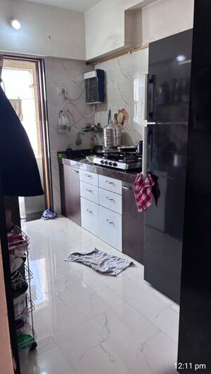 Kitchen in 1 BHK Apartment at Ravi Raj Residency, Mira Road – for Sale