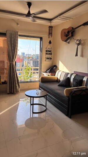 Living Room in 1 BHK Apartment at Ravi Raj Residency, Mira Road – for Sale