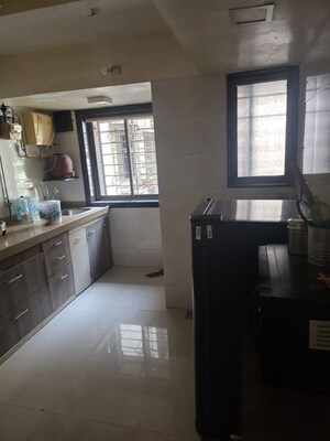 Kitchen in 3 BHK Apartment at Mesacon Crown, Andheri West – for Rent
