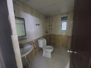 Bathroom in 2.5 BHK Apartment at Saviour Park, Mohan Nagar – for Rent