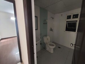 Bathroom in 2.5 BHK Apartment at Saviour Park, Mohan Nagar – for Rent