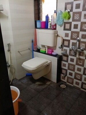 Bathroom in 1 BHK Apartment at Gundecha Valley of Flowers, Kandivali East – for Rent