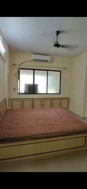 Bedroom in 2 BHK Apartment at Kaveri CHS Goregaon, Goregaon West – for Rent