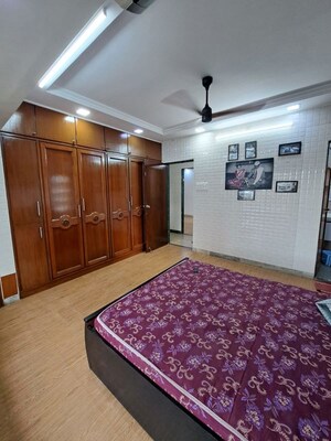 Bedroom in 2 BHK Apartment at Sangam CHS, Goregaon East – for Rent