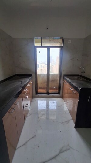Kitchen in 1 BHK Apartment at Trimity Ashwa, Kasarvadavali – for Rent