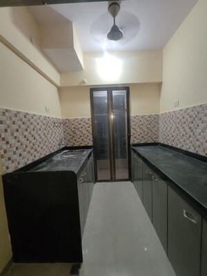 Kitchen in 1 BHK Apartment at Hubtown Greenwoods D Wing, Vartak Nagar – for Rent