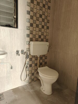 Bathroom in 1 BHK Apartment at Hubtown Greenwoods D Wing, Vartak Nagar – for Rent