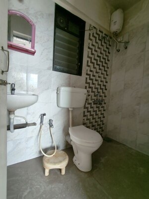 Bathroom in 1 BHK Apartment at Hubtown Greenwoods D Wing, Vartak Nagar – for Rent