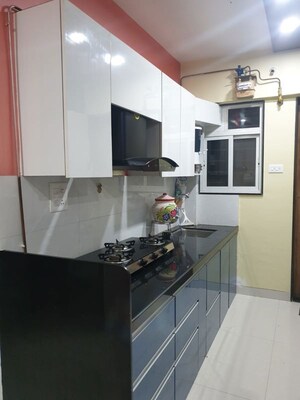 Kitchen in 3 BHK Apartment at Shashwati Reflections, Thergaon – for Rent