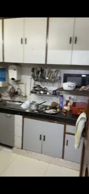 Kitchen in 2 BHK Builder Floor at Green Park – for Sale