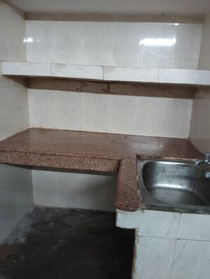 Kitchen in 1 RK Independent House at RWA Apartments Sector 12, Sector 12 – for Rent