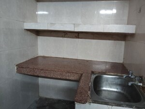 Kitchen in 1 RK Independent House at RWA Apartments Sector 12, Sector 12 – for Rent