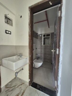 Bathroom in 2 BHK Apartment at Krishna Fairmont, Wakad – for Rent