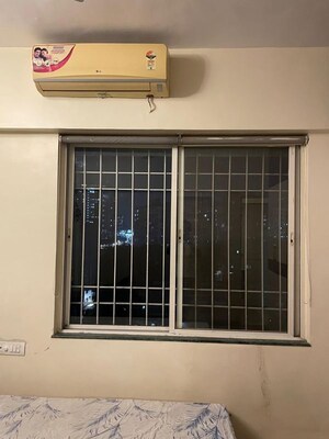 Room in 2 BHK Apartment at Miracle Mark, Wakad – for Rent
