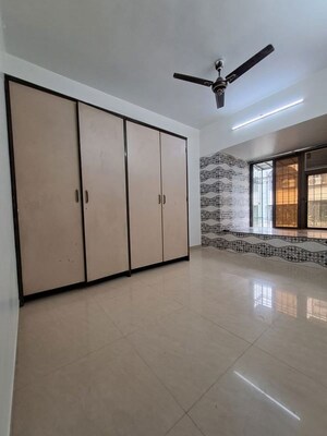 Room in 2 BHK Apartment at Kabra Suburbina Apartments, Goregaon West – for Rent