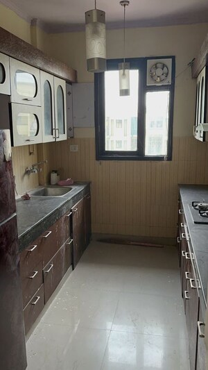 Kitchen in 2 BHK Apartment at Cosmos Greens, Alwar Bypass Road – for Sale