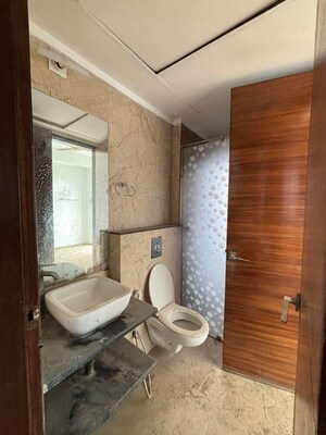 Bathroom in 3 BHK Apartment at Mahagun Mezzaria, Sector 78 – for Rent