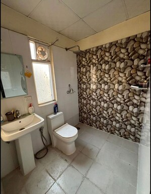 Bathroom in Studio Apartment at Godrej Golf Links Exquisite, Sector 27 Yamuna Expressway – for Sale