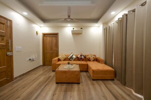Living Room in 2 BHK Apartment at Conscient Habitat 102, Sector 102 – for Rent