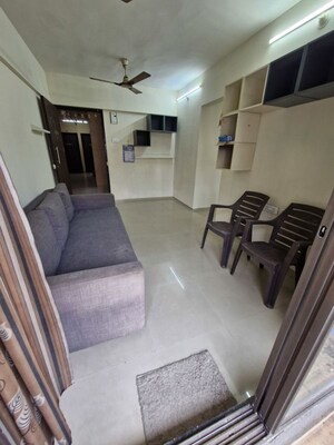 Living Room in 2 BHK Apartment at Rustomjee Virar Avenue L1 L2 And L4 Wing G, Virar West – for Sale