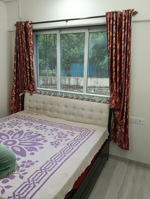 Bedroom in 1 BHK Apartment at Gundecha Greens, Kandivali East – for Rent