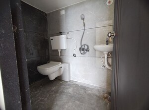 Bathroom in 2 BHK Apartment at Real Emporium, Vasai East – for Rent