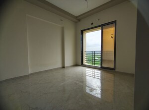 Room in 2 BHK Apartment at Real Emporium, Vasai East – for Rent
