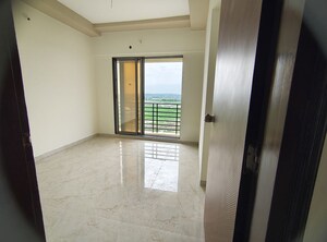 Room in 2 BHK Apartment at Real Emporium, Vasai East – for Rent
