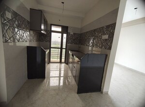 Kitchen in 2 BHK Apartment at Real Emporium, Vasai East – for Rent