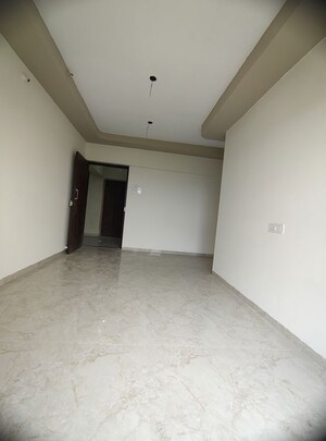 Room in 2 BHK Apartment at Real Emporium, Vasai East – for Rent