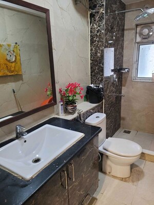 Bathroom in 4 BHK Builder Floor at Sector 23a – for Rent