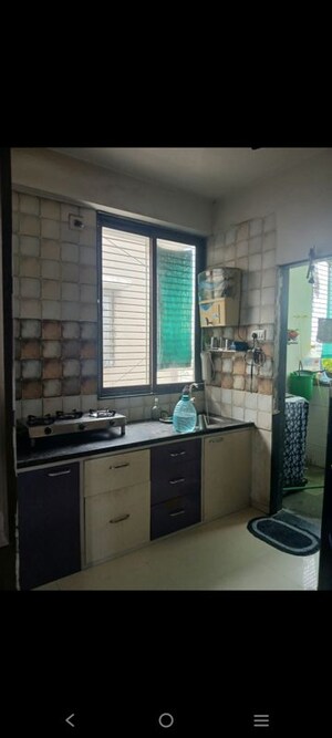 Kitchen in 2 BHK Apartment at Aashray Arise, Shilaj – for Rent