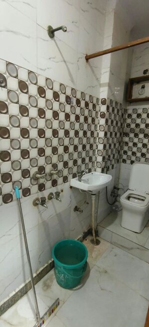 Bathroom in 1 BHK Builder Floor at Dwarka Mor – for Rent