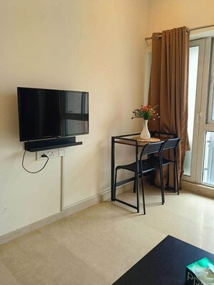 Living Room in 1 BHK Apartment at Omkar Signet, Malad East – for Rent