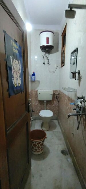 Bathroom in 2 BHK Builder Floor at Dwarka Mor – for Rent