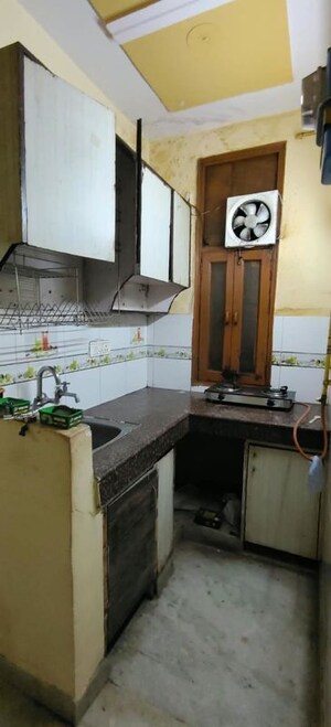 Kitchen in 2 BHK Builder Floor at Dwarka Mor – for Rent