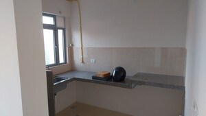 Kitchen in 1 BHK Apartment at Piramal Vaikunth, Balkum Pada – for Rent