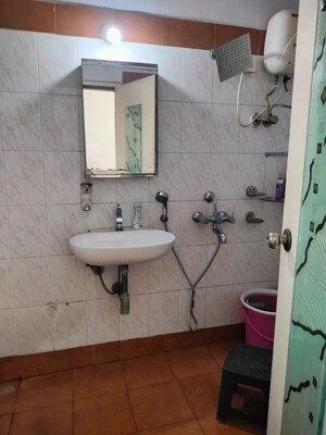 Bathroom in 3 BHK Apartment at Dheeraj Valley, Goregaon East – for Rent